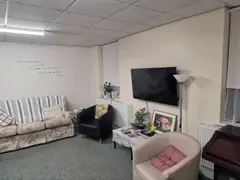 The screen and seating area in the Downstairs Lounge