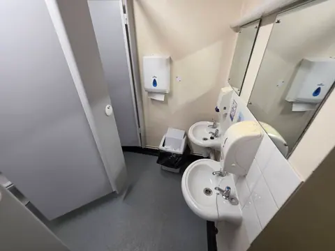 Washbasins and cubicles in the upstairs ladies' toilets