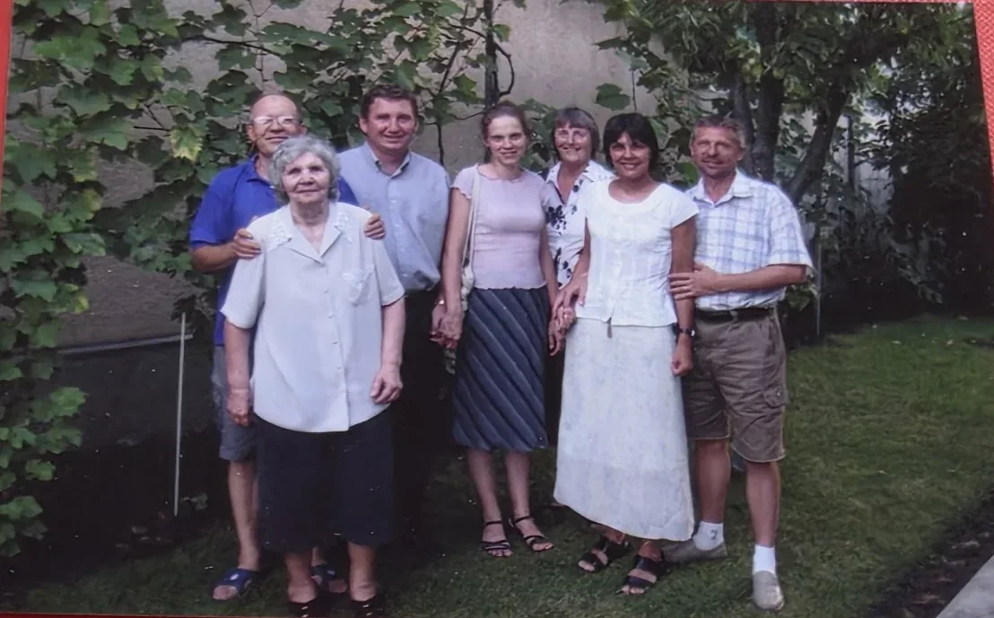 A group gathered outdoors during an overseas church partnership visit