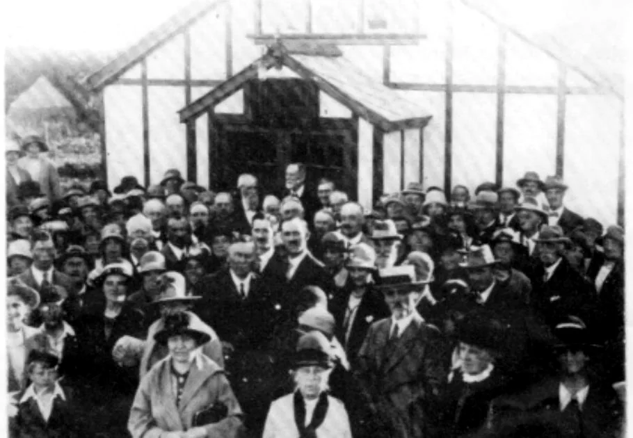 A large congregation gathered outside the small Salisbury Road church building