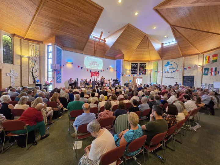 A wide view from the back of the full sanctuary during the 100 Year Celebration Service.