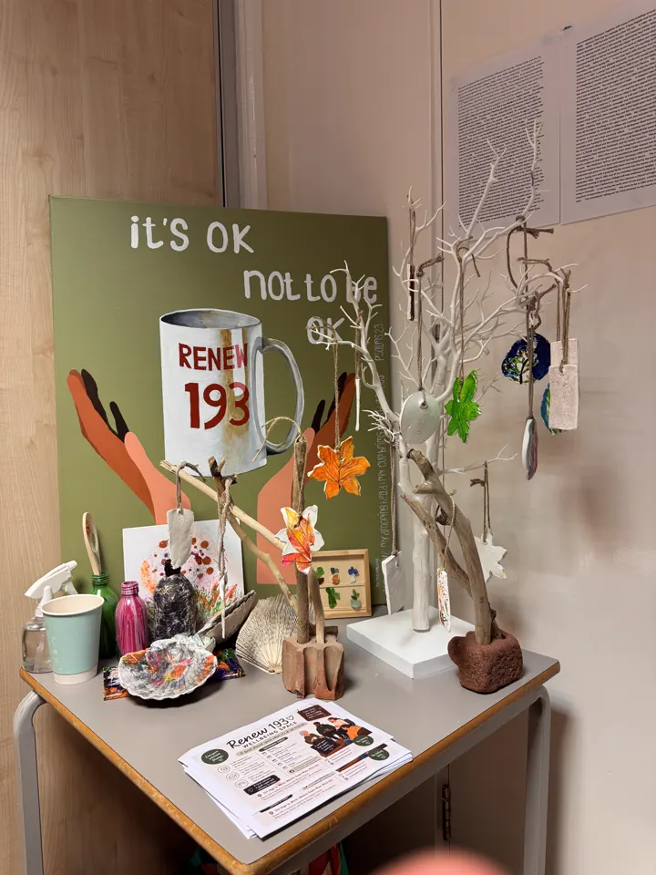 A Renew 193 display with artwork and information at the Vintage Fayre.