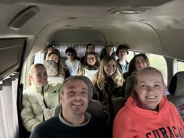 A group travelling together in a minibus in Egypt.