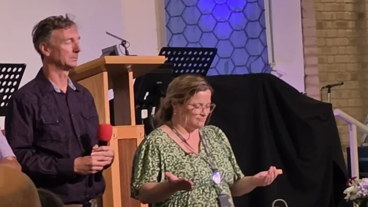 Gerry Stanton being prayed for